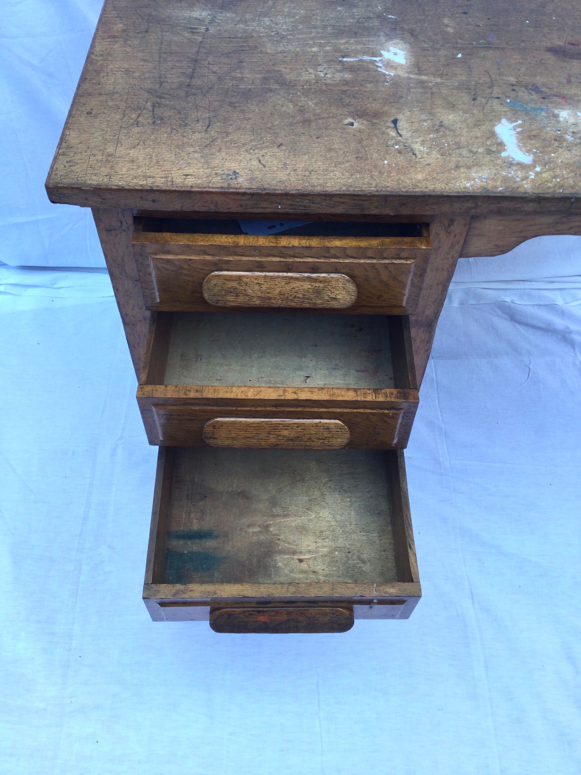 Wooden desk with three drawers