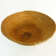 Old large bread basket of baker in braided wicker