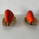 Pair of orange plexiglass and curved brass wall lights, 1950s, Germany