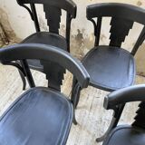 Set of 7 black bistro chairs