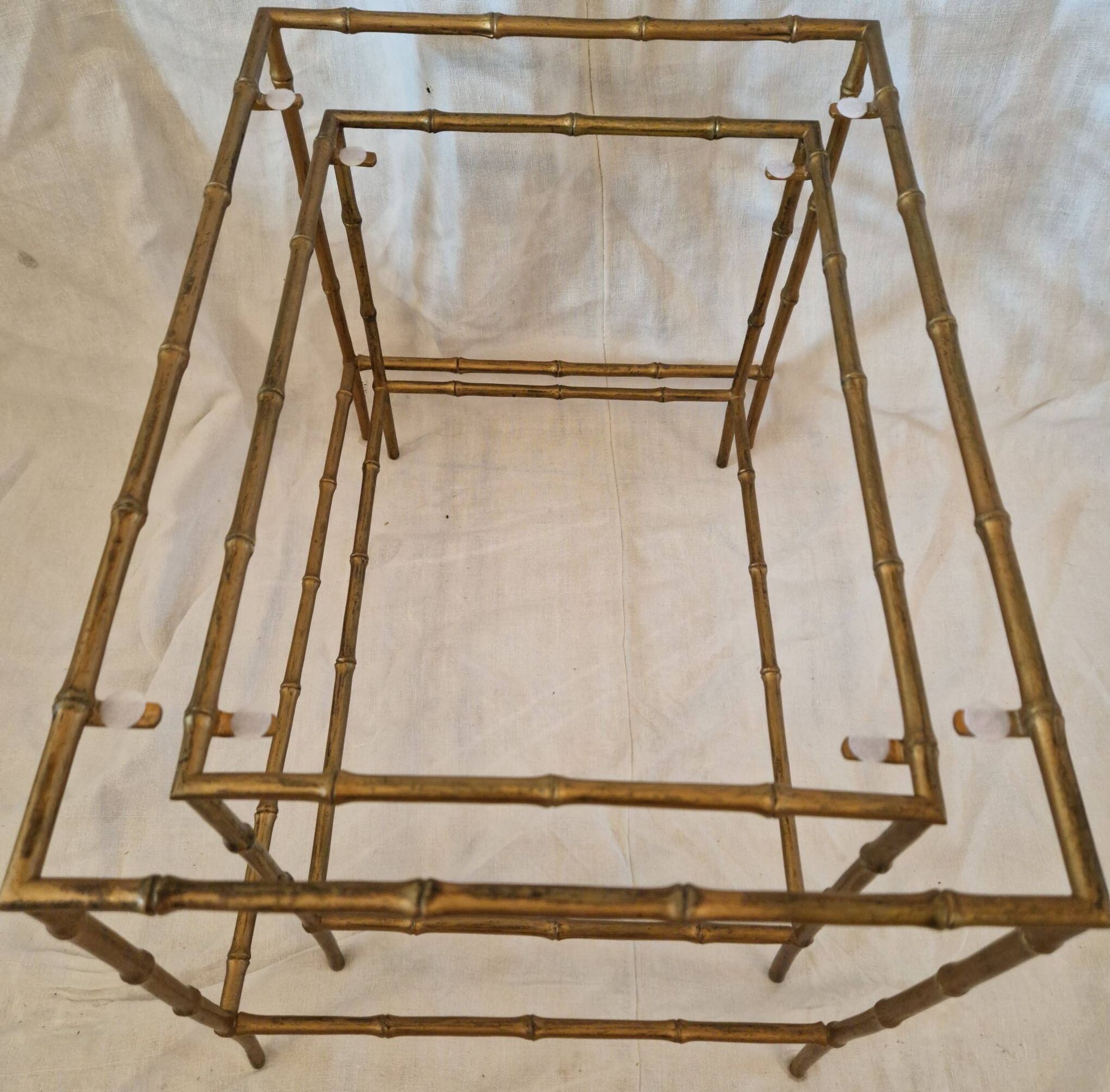 Pair of vintage nesting tables in faux bamboo with a gold finish – distressed mirrors
