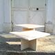 Two coffee tables giggle in travertine