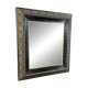 19th-century mirror Napoleon III in blackened wood on a gold background.