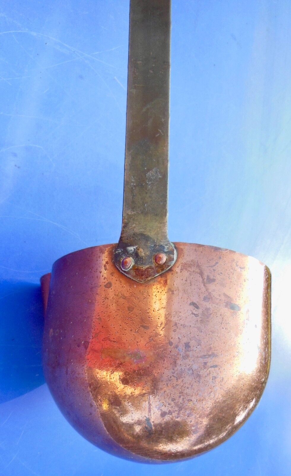 Ladle or old copper measure with spout