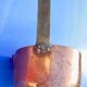Ladle or old copper measure with spout