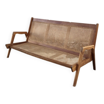 caned teak bench