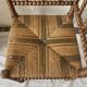 Corner chair in straw and turned wood, fireside chair.