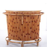 Vintage bamboo Tiki bar cocktail bar with 2 bar stools.