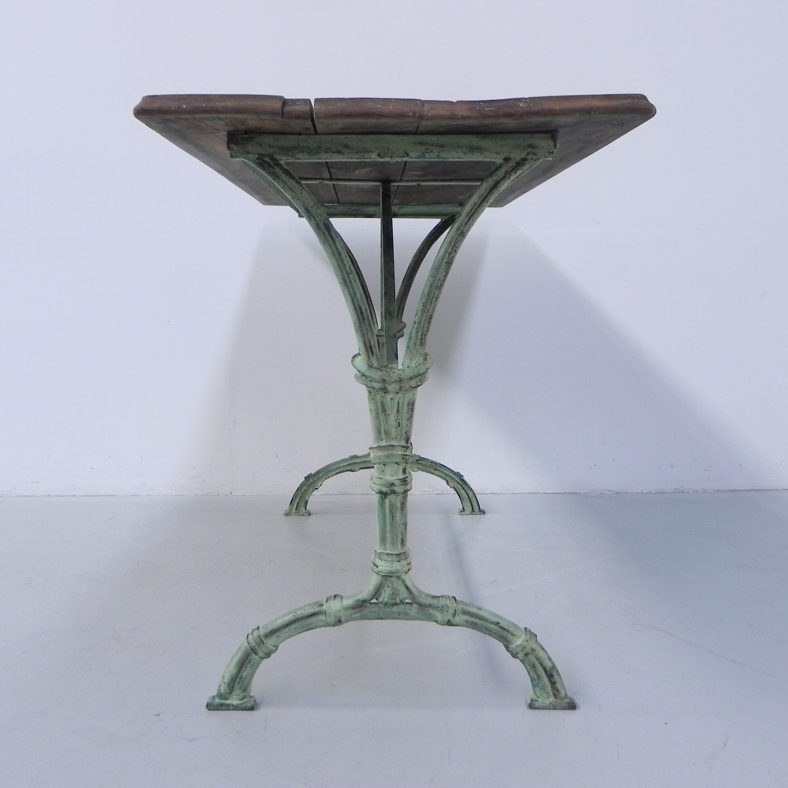 Art nouveau bistro table with cast iron frame