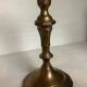 Four brass candle holders