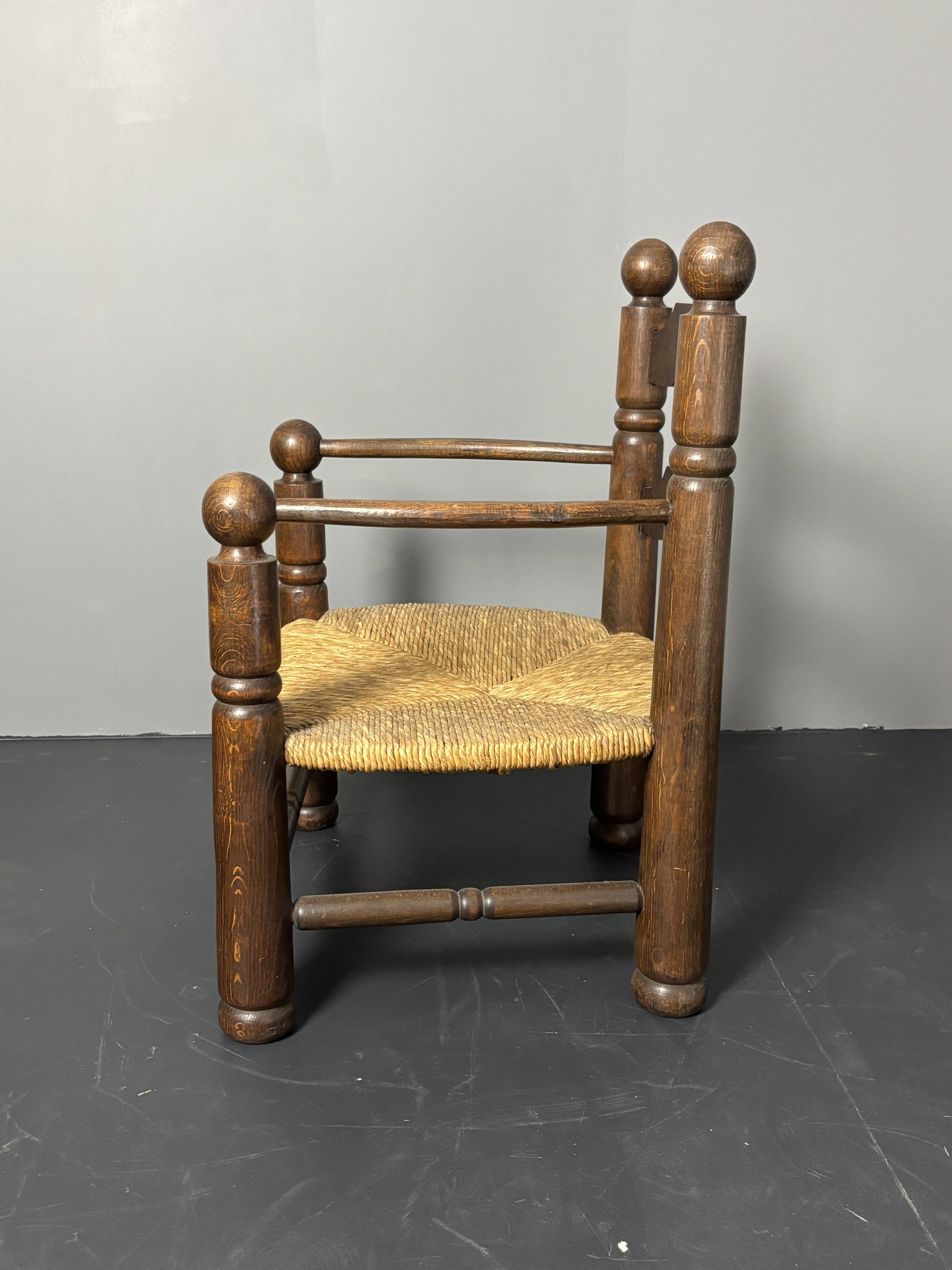 Brutalist French low rush oak side armchair by Charles Dudouyt ca 1940s