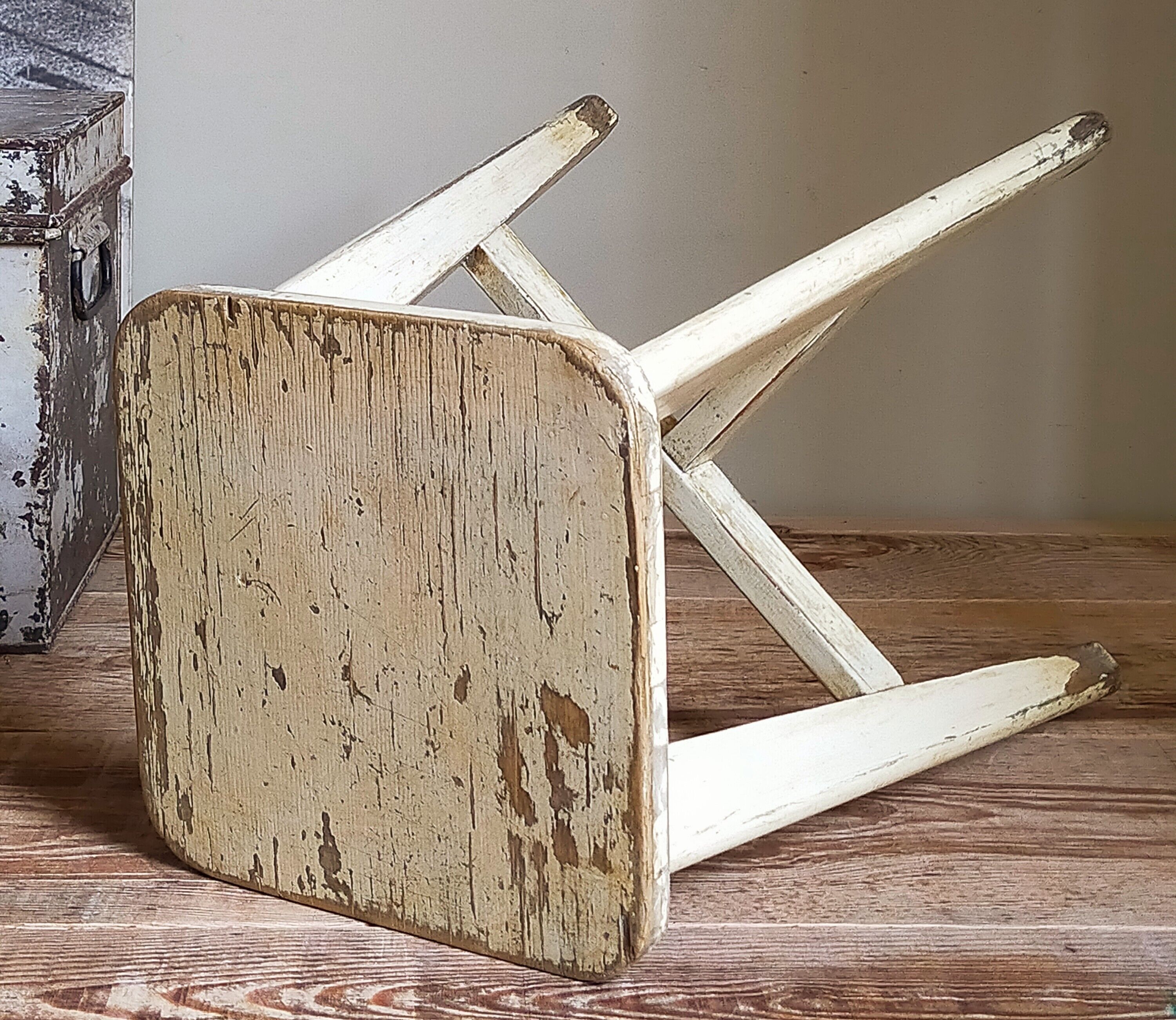 Old workshop stool in patinated solid wood