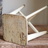 Old workshop stool in patinated solid wood
