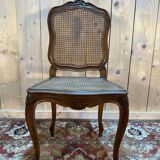Set of 10 Louis XV style chairs in walnut and cane.