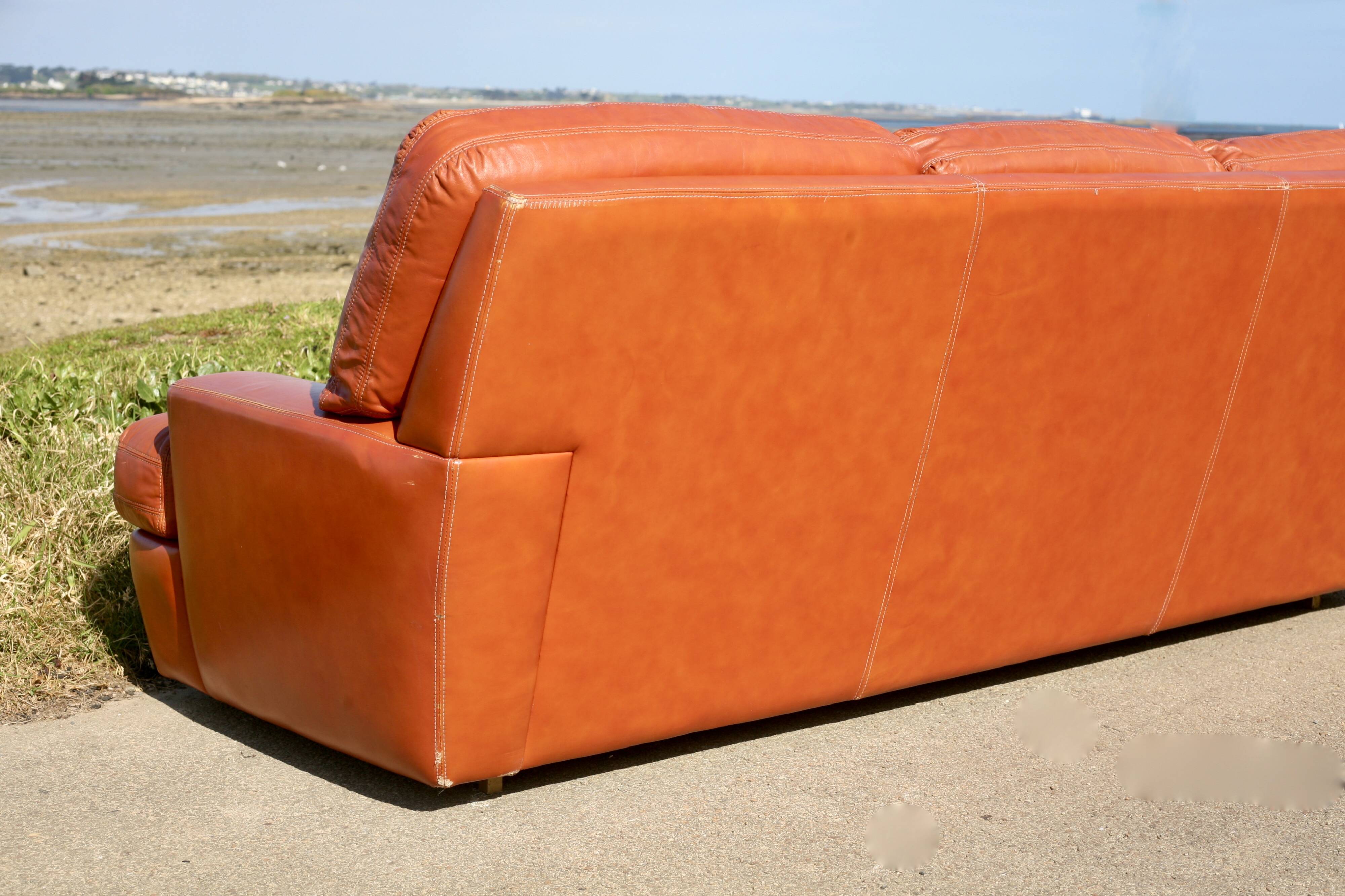 Space age sofa. Tan leather. Circa 1970