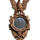 Miroir en bois doré Empire à décor d’aigle 40x97cm