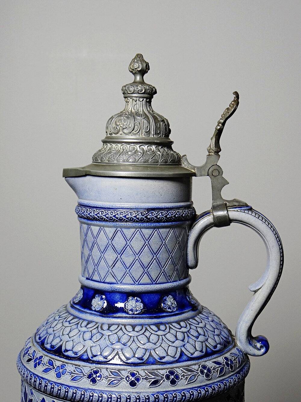 Large salt-glazed stoneware beer jug with tin, Germany, Westerwald type.