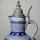 Large salt-glazed stoneware beer jug with tin, Germany, Westerwald type.