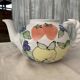 Vintage coloured ceramic jug in cream white with hand-painted decoration (Hungary)