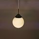 Small Art Deco hanging lamp in cream coloured glass and bakelite top.