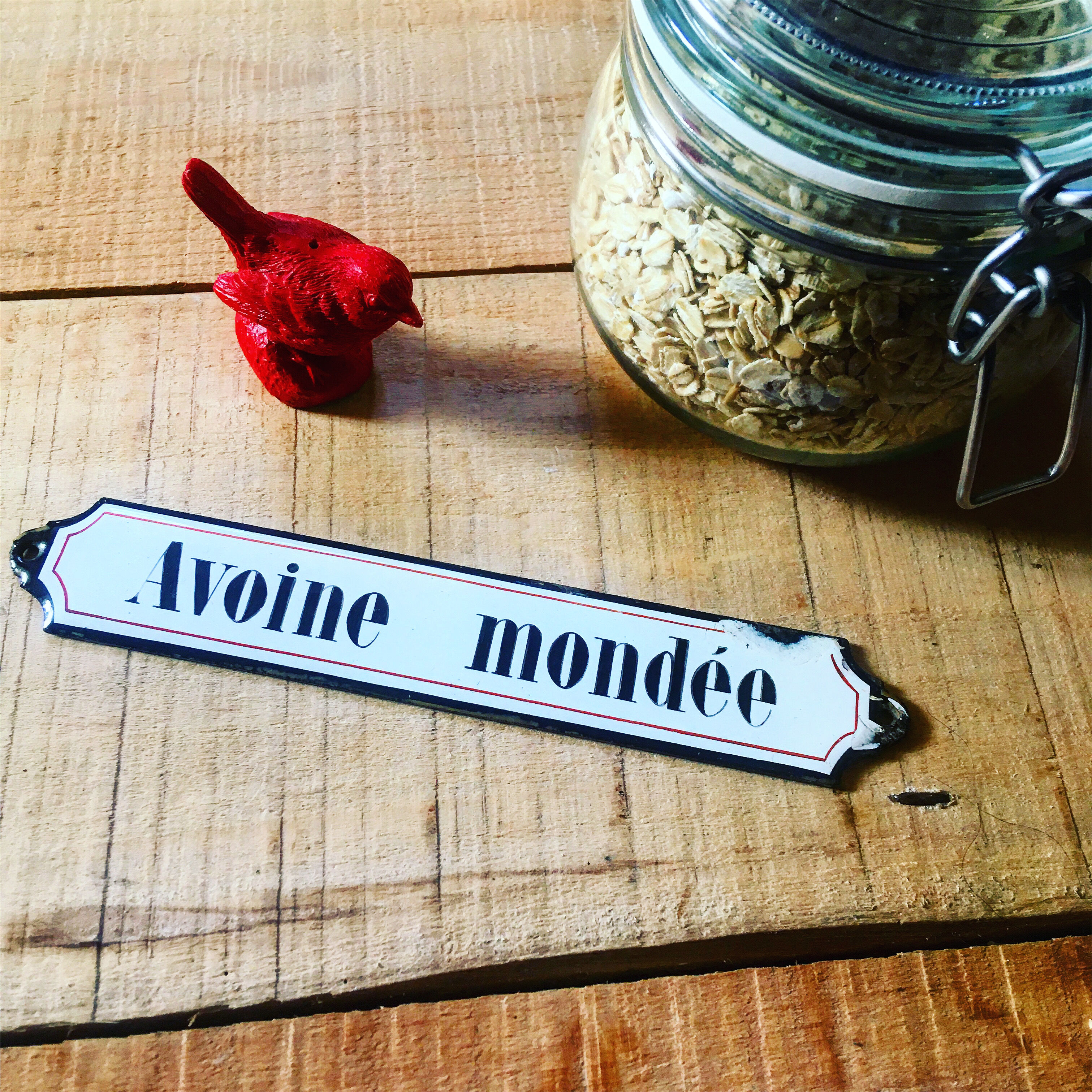 Ancient enamelplate of seed or grocery store. Furniture by trade. 1900s/1910s.