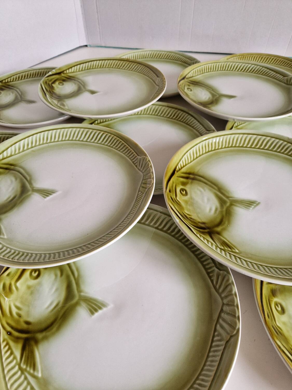 Set of 12 fish plates from the Moulin des Loups factory in Orchies