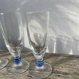 6 clear champagne flutes with blue stems, designer style