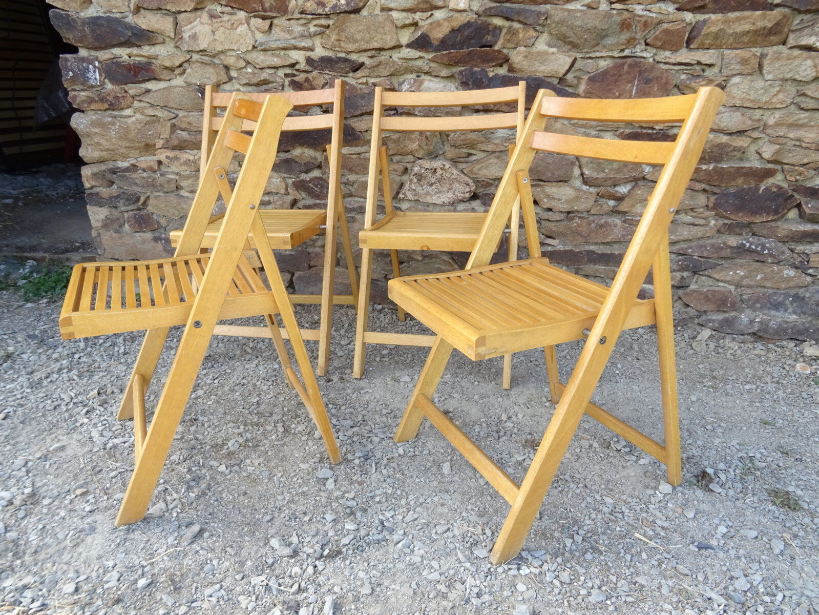 Series of 4 folding chairs in solid beech