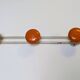 Vintage orange triple coat hook — metal and lacquered discs from the 60s/70s