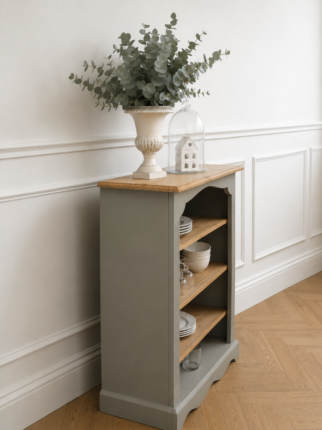 Green-grey library, wooden shelf and shelves in natural wood.