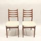 Pair of scandinavian chairs with loop fabric