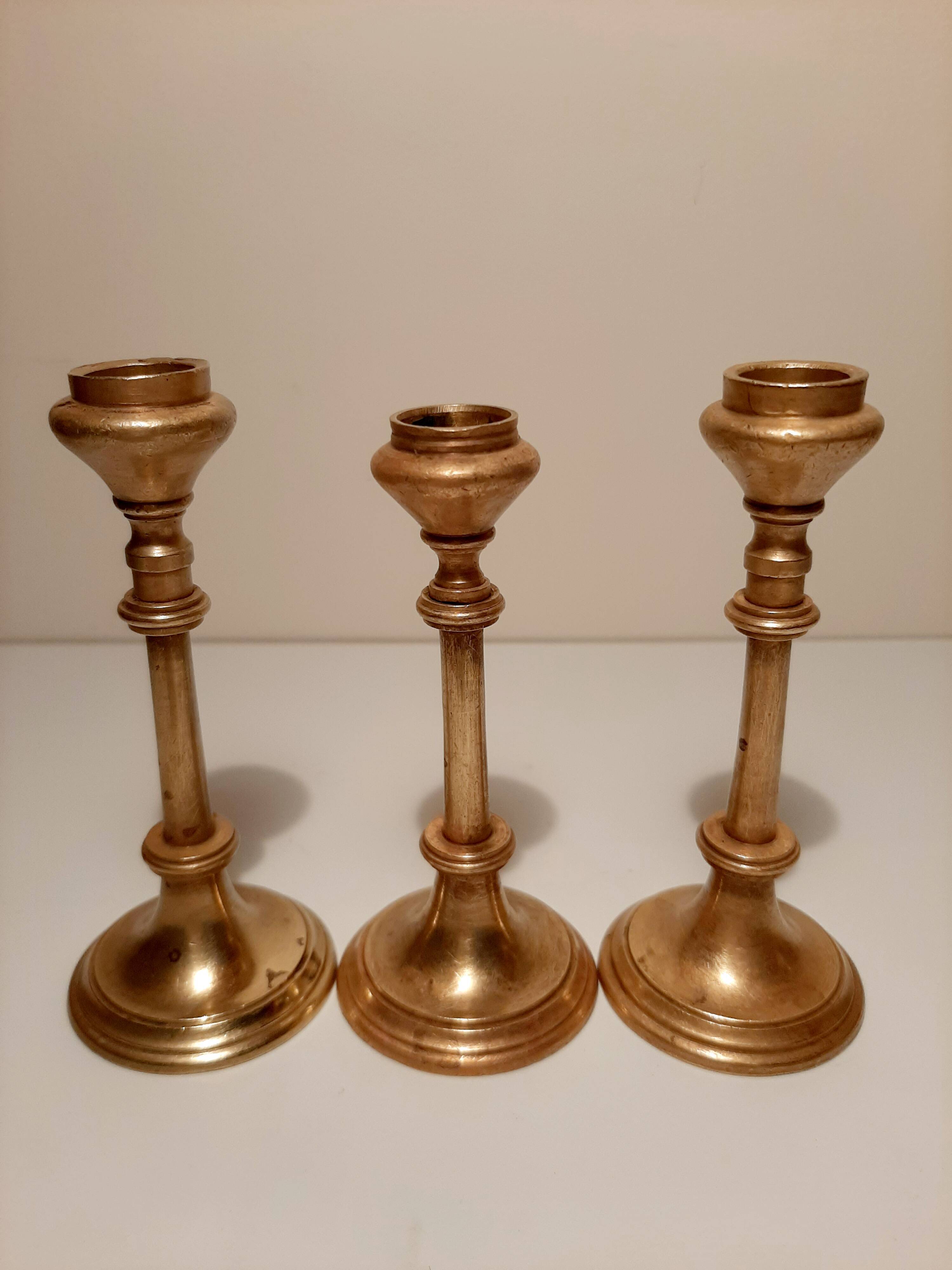 Set of gilded brass candle holders
