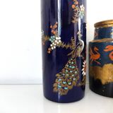 Two small vases, one with dragons and one scroll with peacock