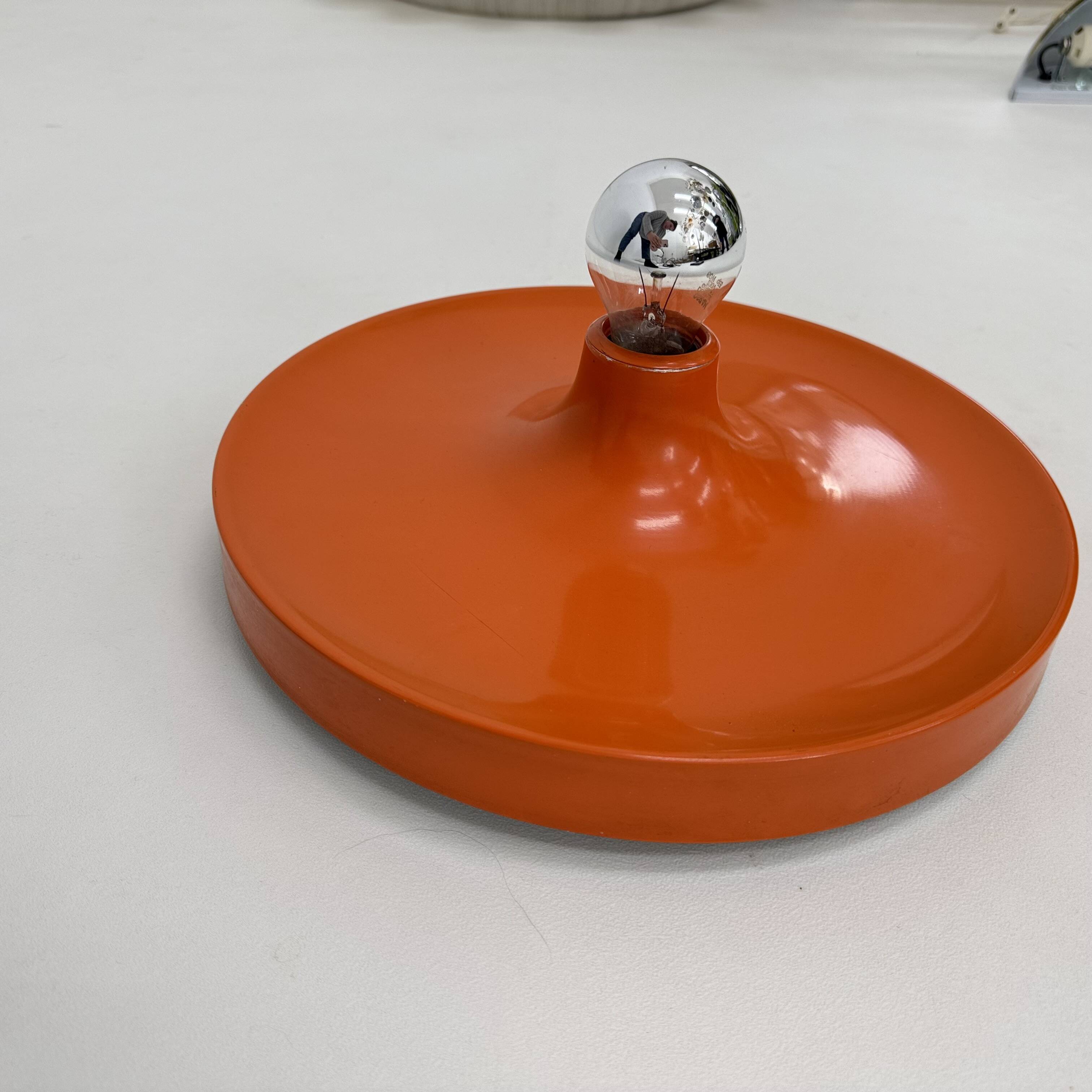 Honsel orange space age disc lamp , 1970s selected by Charlotte perriand