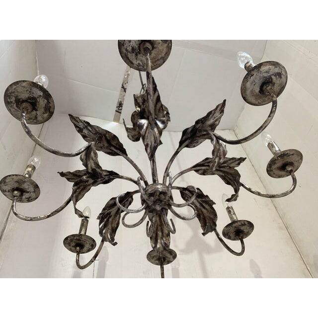 Contemporary brunish-silver florentine wrought iron chandelier