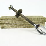 Sugar tongs in its case