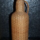 Braided rattan/wicker bottle