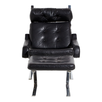 Fauteuil en cuir avec pouf de Reinhold Adolf pour Cor mk9220