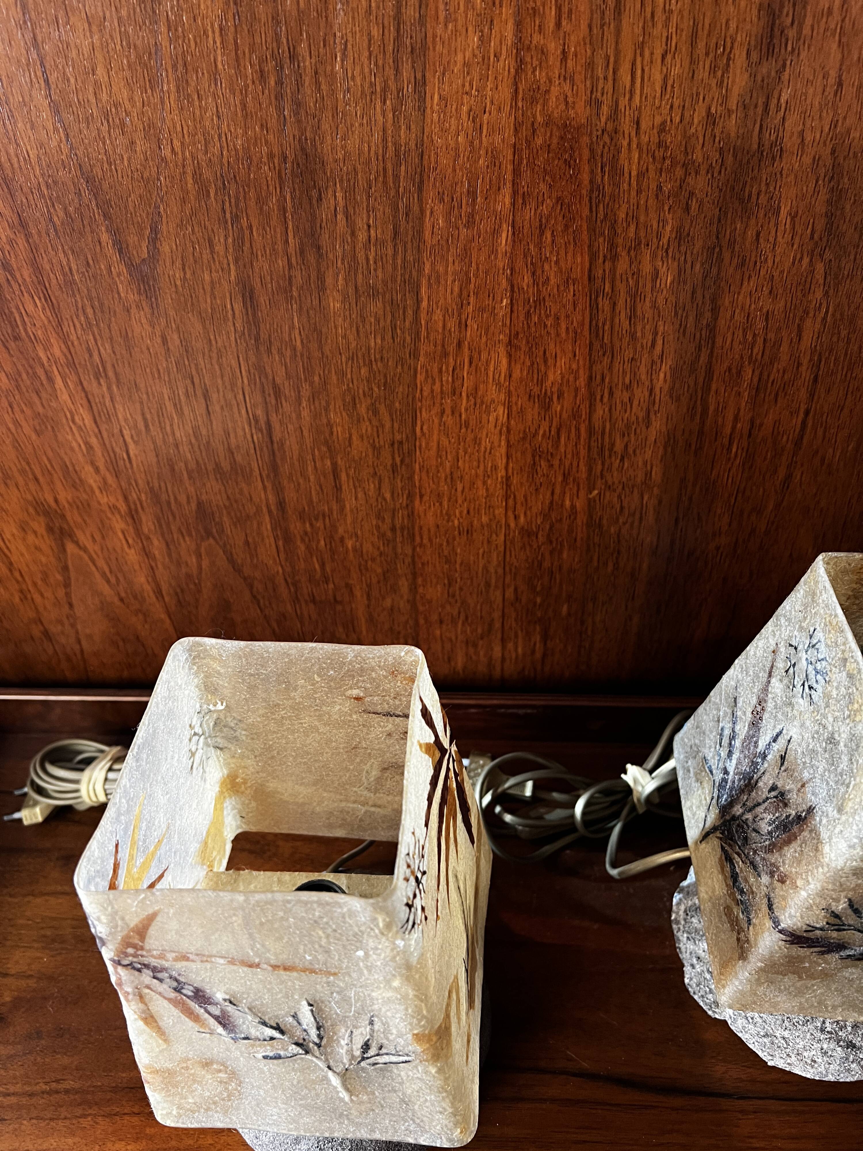 Pair of granite lamps with resin lampshades