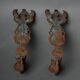 Pair of Empire period bronze sconces decorated with a winged woman
