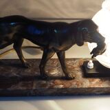 French Art Deco hunting dog on a marble base with a switched lamp.