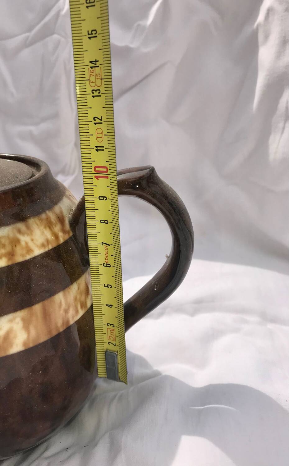 A brown England teapot