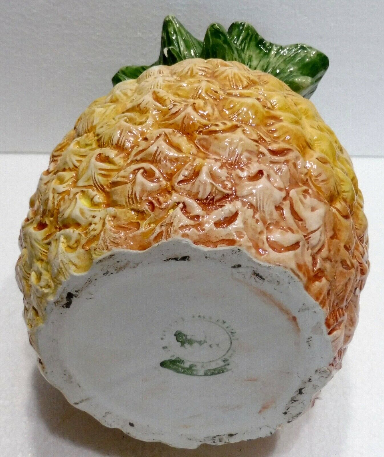 Pitcher on pineapple earthenware