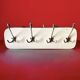 Vintage wall coat rack in white Formica - 4 cast aluminum coat hooks