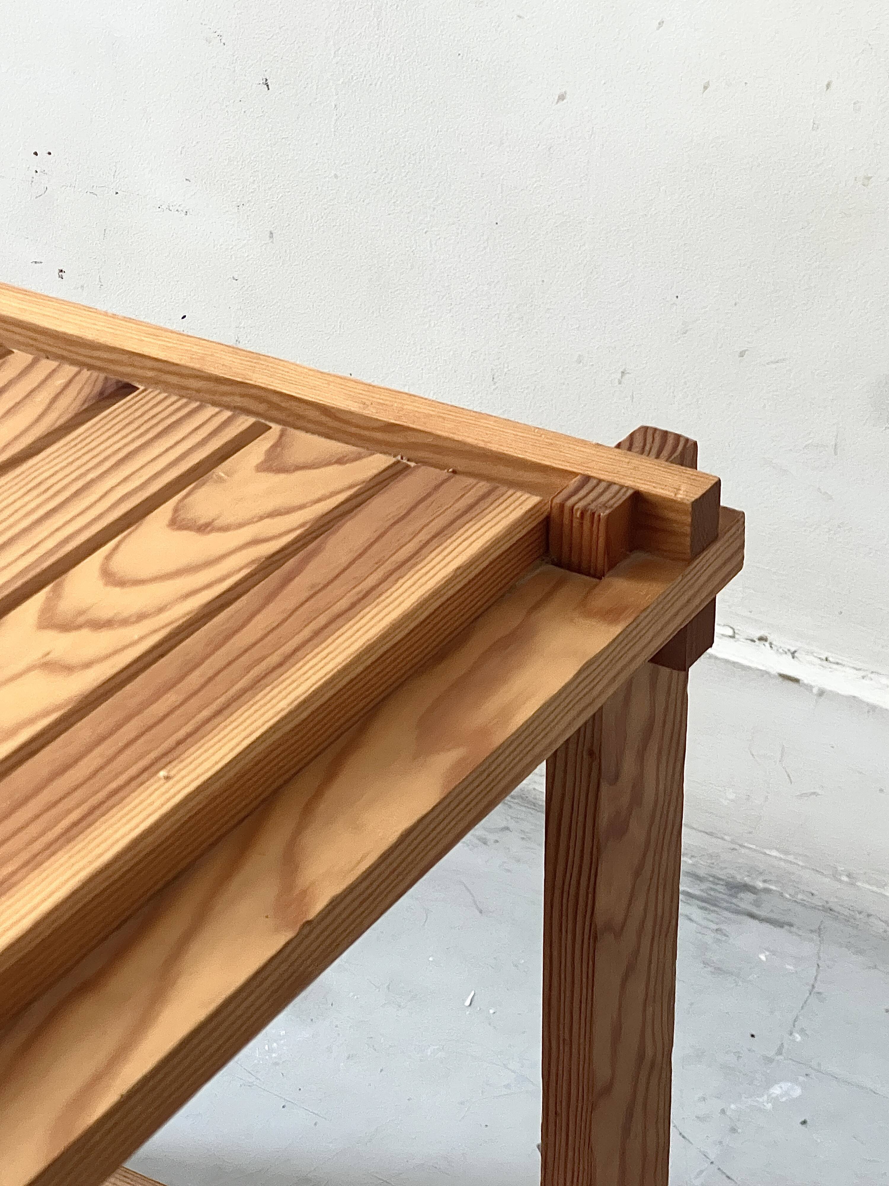Modernist pine side table / bedside table, 1970 design.