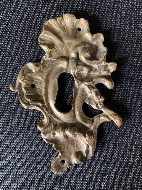 Pair of rocaille bronze keyholes from the 19th century