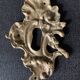 Pair of rocaille bronze keyholes from the 19th century