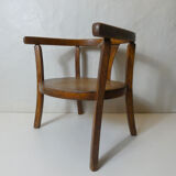 Old wooden armchair for children