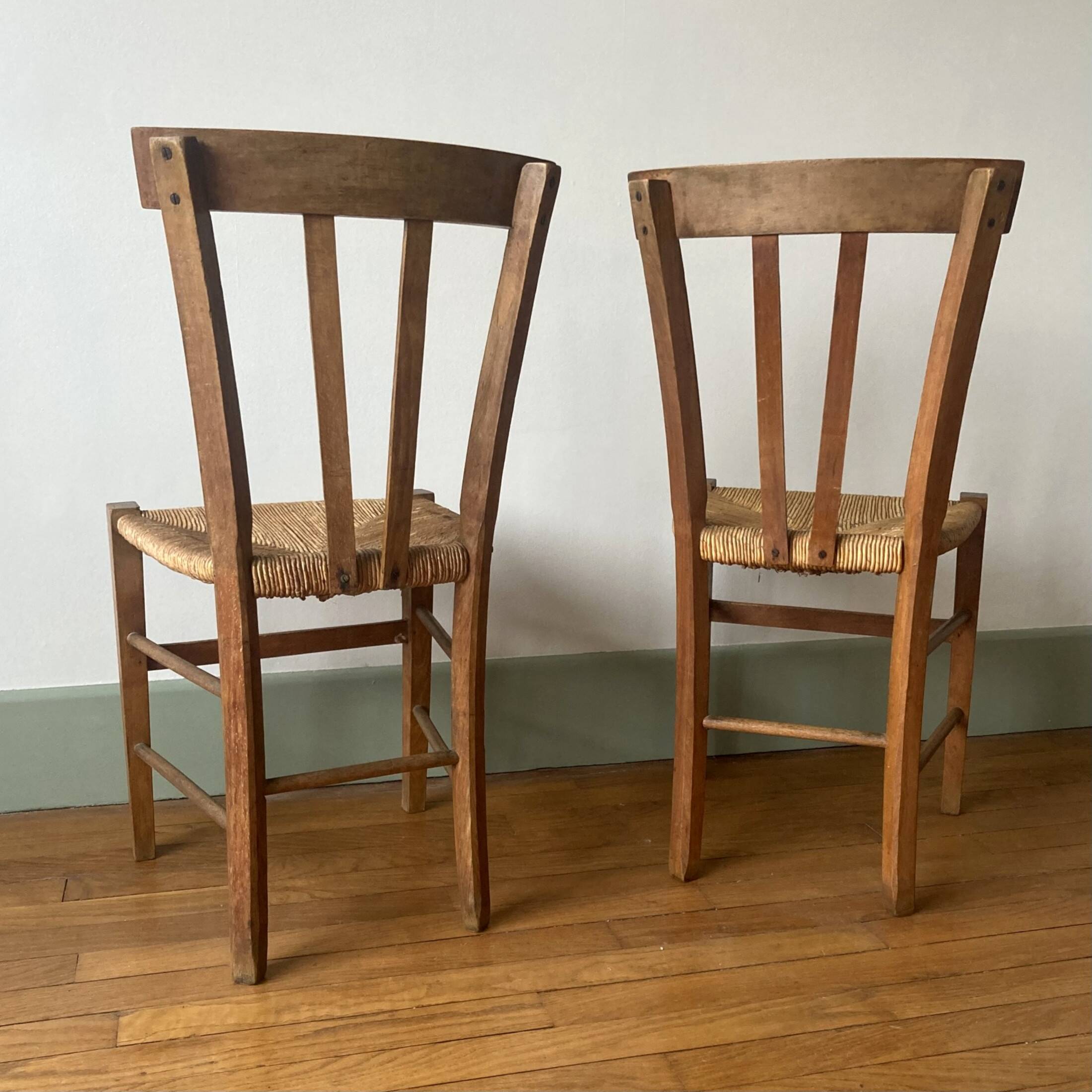 Set of 2 old mulched wooden chairs