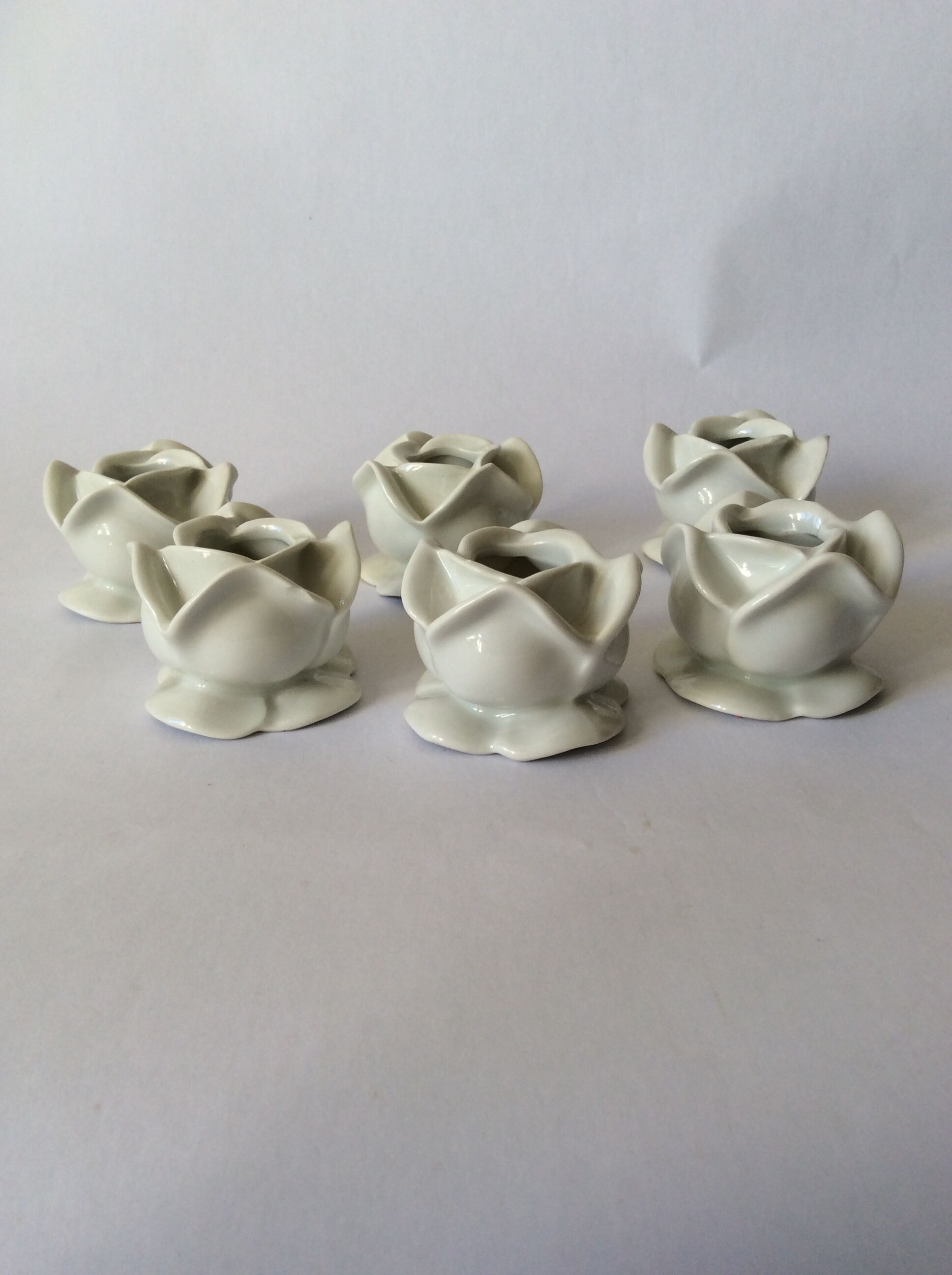 set of 6 pink candle holders in white porcelain